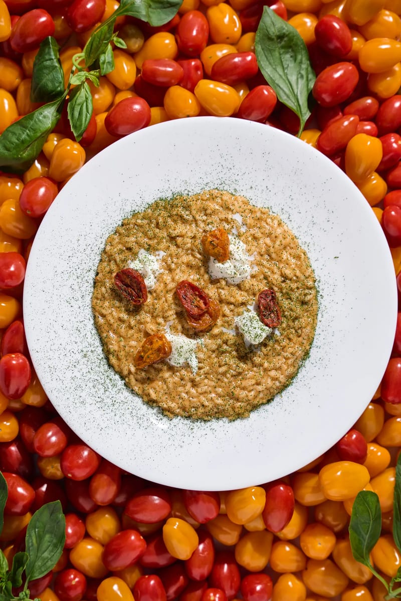 Risotto al pomodoro con datterini confit e stracciatella